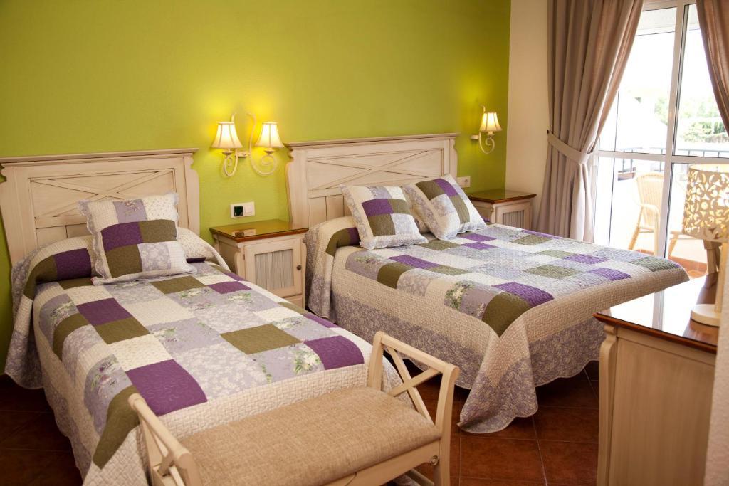 Hostal Los Pinos 자호라 객실 사진
